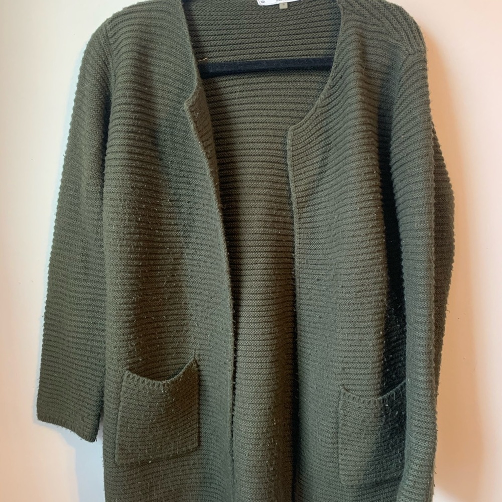s/i/o/n/i sweater